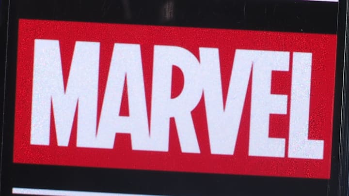 In this photo illustration, Marvel Entertainment logo seen...