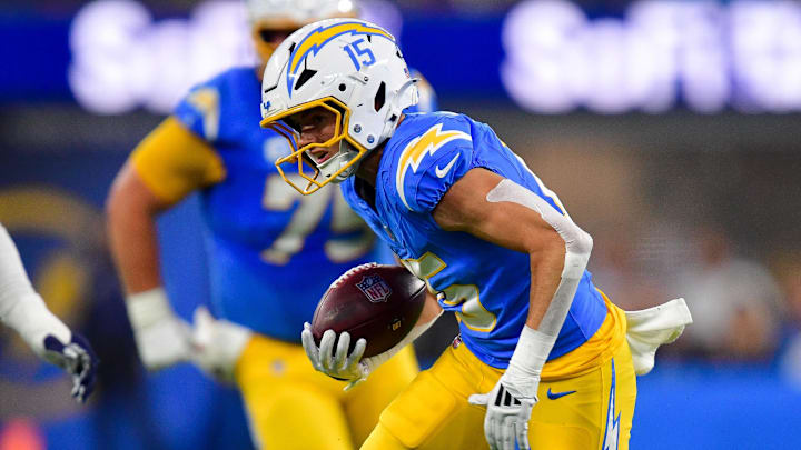 Dec 19, 2024; Inglewood, California, USA; Los Angeles Chargers wide receiver Ladd McConkey (15) runs the ball against the Denver Broncos during the second half at SoFi Stadium. Mandatory Credit: Gary A. Vasquez-Imagn Images