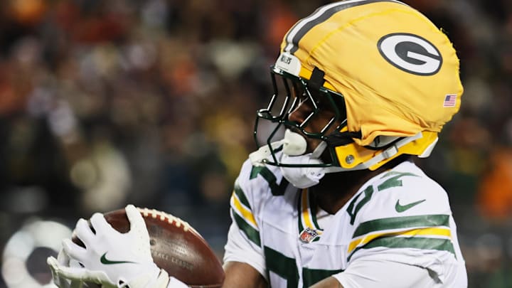 Green Bay Packers receiver Romeo Doubs (87) catches a thirty-touchdown pass against the Chicago Bears.