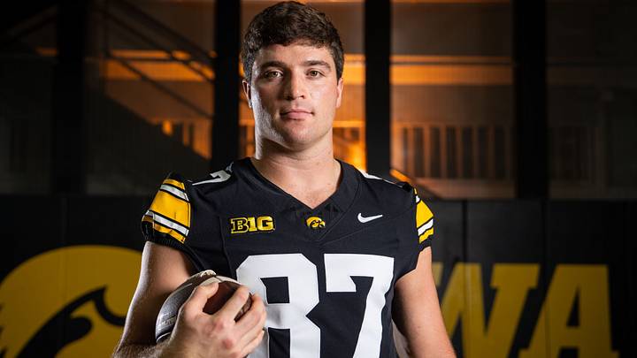 Iowa tight end Addison Ostrenga (87) stands for a portrait during Hawkeye football media day, Friday, Aug. 14, 2026, in Iowa City.