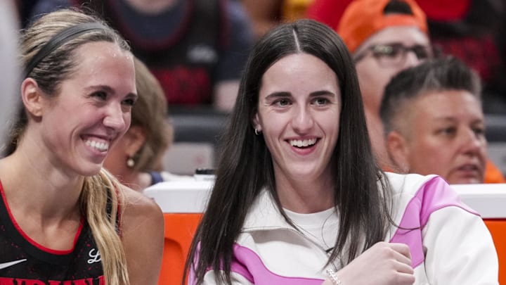 Sep 9, 2025; Indianapolis, Indiana, USA; Indiana Fever guard Lexie Hull (10) and Indiana Fever guard Caitlin Clark (22) laugh from the bench during the game against the Minnesota Lynx at Gainbridge Fieldhouse. Mandatory Credit: Grace Smith-USA TODAY Network via Imagn Images