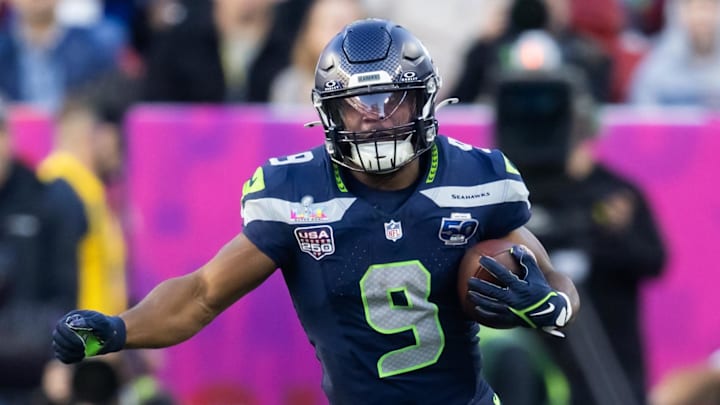 Feb 8, 2026; Santa Clara, CA, USA; Seattle Seahawks running back Kenneth Walker III (9) runs the ball against New England Patriots defensive end Milton Williams (97) during Super Bowl LX at Levi's Stadium. Mandatory Credit: Mark J. Rebilas-Imagn Images Feb 8, 2026; Santa Clara, CA, USA; Seattle Seahawks running back Kenneth Walker III (9) runs the ball against New England Patriots defensive end Milton Williams (97) during Super Bowl LX at Levi's Stadium. Mandatory Credit: Mark J. Rebilas-Imagn Images