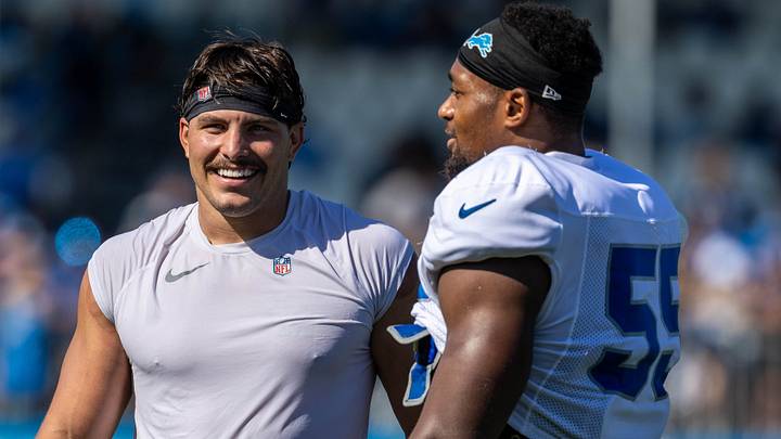 Detroit Lions linebacker Malcolm Rodriguez (44) smiles as he talks with linebacker Derrick Barnes (55) following practice Detroit Lions linebacker Malcolm Rodriguez (44) smiles as he talks with linebacker Derrick Barnes (55) following practice
