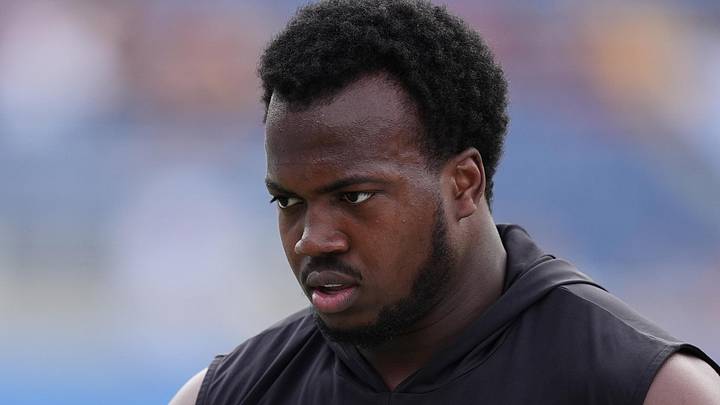 Dec 28, 2024; Orlando, FL, USA; Miami Hurricanes defensive lineman Rueben Bain Jr. (4) warms up prior to the game against the Iowa State Cyclones at Camping World Stadium. Mandatory Credit: Jasen Vinlove-Imagn Images