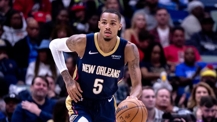 Jan 17, 2025; New Orleans, Louisiana, USA; New Orleans Pelicans guard Dejounte Murray (5) brings the ball up court against the Utah Jazz during the first half at Smoothie King Center. Mandatory Credit: Stephen Lew-Imagn Images