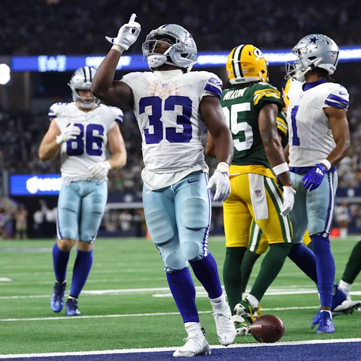 Dallas Cowboys running back Javonte Williams celebrates after scoring a touchdown against the Green Bay Packers.
