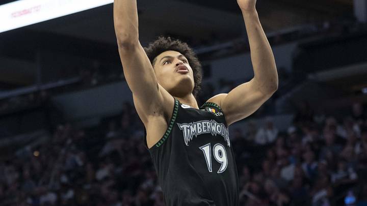 Apr 12, 2026; Minneapolis, Minnesota, USA; Minnesota Timberwolves forward Joan Beringer (19) drives to the basket against the New Orleans Pelicans in the second half at Target Center. Mandatory Credit: Jesse Johnson-Imagn Images