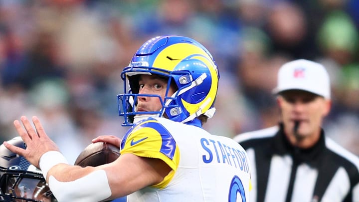Jan 25, 2026; Seattle, WA, USA; Los Angeles Rams quarterback Matthew Stafford (9) passes against Seattle Seahawks defensive end DeMarcus Lawrence (0) during the first half in the 2026 NFC Championship Game at Lumen Field. Mandatory Credit: Kevin Ng-Imagn Images Jan 25, 2026; Seattle, WA, USA; Los Angeles Rams quarterback Matthew Stafford (9) passes against Seattle Seahawks defensive end DeMarcus Lawrence (0) during the first half in the 2026 NFC Championship Game at Lumen Field. Mandatory Credit: Kevin Ng-Imagn Images