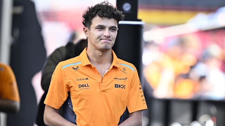 Oct 19, 2024; Austin, Texas, USA; McLaren Formula 1 Team driver Lando Norris (4) of Team Great Britain walks into the track before the Sprint Race in the 2024 Formula One US Grand Prix at Circuit of the Americas. Mandatory Credit: Jerome Miron-Imagn Images