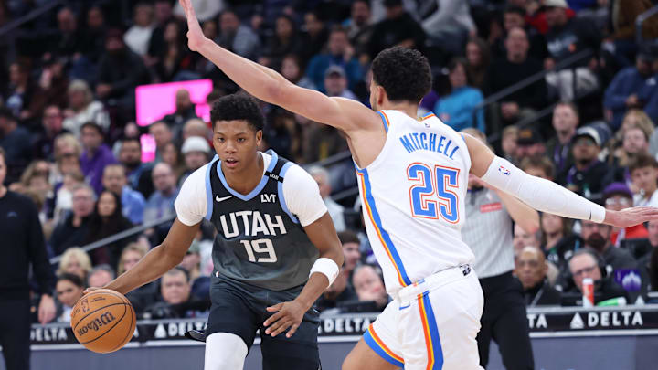 Dec 7, 2025; Salt Lake City, Utah, USA; Utah Jazz guard Ace Bailey (19) drives against Oklahoma City Thunder guard Ajay Mitchell (25) during the second half at Delta Center. Mandatory Credit: Rob Gray-Imagn Images Dec 7, 2025; Salt Lake City, Utah, USA; Utah Jazz guard Ace Bailey (19) drives against Oklahoma City Thunder guard Ajay Mitchell (25) during the second half at Delta Center. Mandatory Credit: Rob Gray-Imagn Images