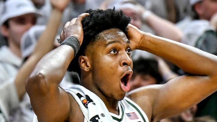 Michigan State's Cam Ward reacts to Coen Carr's dunk against Maryland during the second half on Saturday, Jan. 24, 2026, at the Breslin Center in East Lansing.