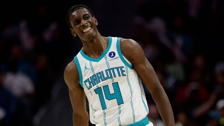 Mar 28, 2026; Charlotte, North Carolina, USA; Charlotte Hornets forward Moussa Diabaté (14) walks back down the court during the third quarter against the Philadelphia 76ers at Spectrum Center. Mandatory Credit: Brian Westerholt-Imagn Images