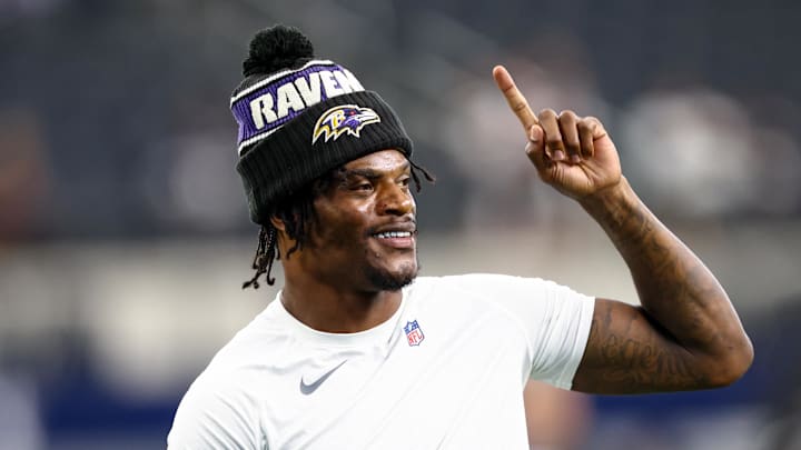 Aug 16, 2025; Arlington, Texas, USA;  Baltimore Ravens quarterback Lamar Jackson (8) warms up before the game against the Dallas Cowboys at AT&T Stadium. Mandatory Credit: Kevin Jairaj-Imagn Images