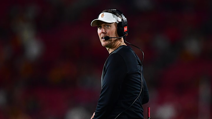 Sep 20, 2025; Los Angeles, California, USA; Southern California Trojans head coach Lincoln Riley watches game action against the Michigan State Spartans during the second half at the Los Angeles Memorial Coliseum. 