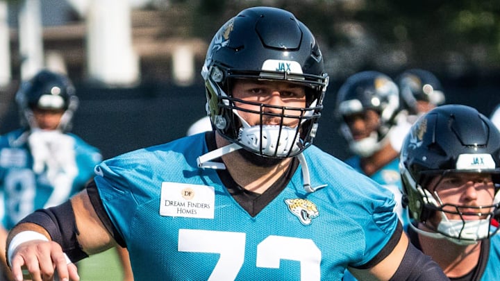 Jacksonville Jaguars center Robert Hainsey (73) warms up with Jacksonville Jaguars center Luke Fortner (79) during the seventh organized team activity at the Miller Electric Center in Jacksonville, Fla. Monday, June 2, 2025. [Doug Engle/Florida Times-Union]