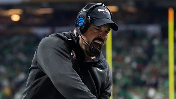 Jan 20, 2025; Atlanta, GA, USA; Ohio State Buckeyes head coach Ryan Day reacts as he celebrates a play against the Notre Dame Fighting Irish during the CFP National Championship college football game at Mercedes-Benz Stadium. Mandatory Credit: Mark J. Rebilas-Imagn Images