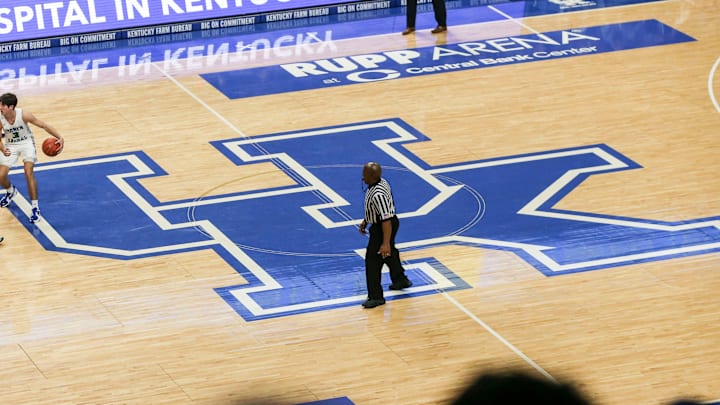 Kentucky-commit Reed Sheppard brings the ball up the court atop the large UK logo at the UK HealthCare Boys Sweet 16 tournament Wednesday at Rupp Arena. March 15, 2022

2022 Sweet Sixteen Boys Basketball Tournament