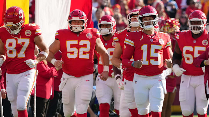 Nov 23, 2025; Kansas City, Missouri, USA; Kansas City Chiefs tight end Travis Kelce (87) and center Creed Humphrey (52) and quarterback Patrick Mahomes (15) run onto the field before the game against the Indianapolis Colts at GEHA Field at Arrowhead Stadium. Mandatory Credit: Denny Medley-Imagn Images