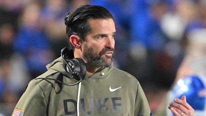 Nov 15, 2025; Durham, North Carolina, USA; Duke Blue Devils head coach Manny Diaz reacts during the third quarter against the Virginia Cavaliers at Wallace Wade Stadium. Mandatory Credit: Zachary Taft-Imagn Images Nov 15, 2025; Durham, North Carolina, USA; Duke Blue Devils head coach Manny Diaz reacts during the third quarter against the Virginia Cavaliers at Wallace Wade Stadium. Mandatory Credit: Zachary Taft-Imagn Images