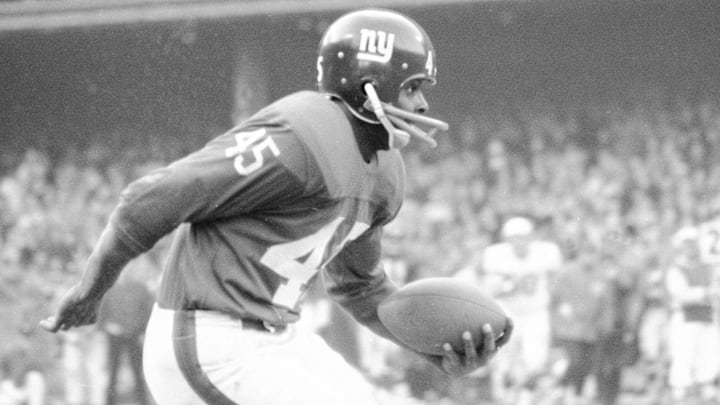 November 6, 1966; New York City, NY, USA; New York Giants' Homer Jones (45) runs with ball during a game against the St. Louis Cardinals at Yankee Stadium in New York City on November 6, 1966. November 6, 1966; New York City, NY, USA; New York Giants' Homer Jones (45) runs with ball during a game against the St. Louis Cardinals at Yankee Stadium in New York City on November 6, 1966.