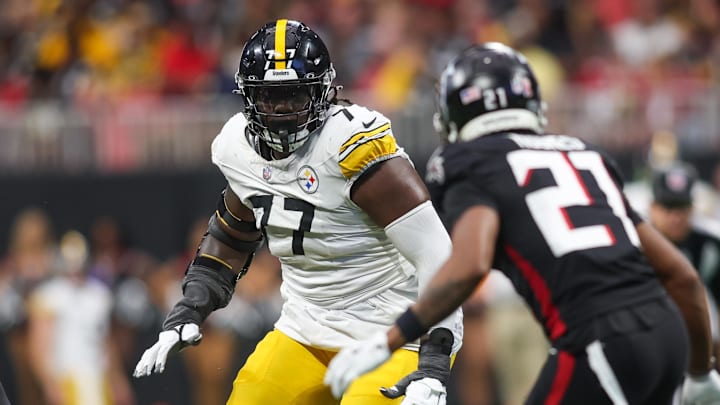 Sep 8, 2024; Atlanta, Georgia, USA; Pittsburgh Steelers offensive tackle Broderick Jones (77) blocks against the Atlanta Falcons in the fourth quarter at Mercedes-Benz Stadium. Mandatory Credit: Brett Davis-Imagn Images