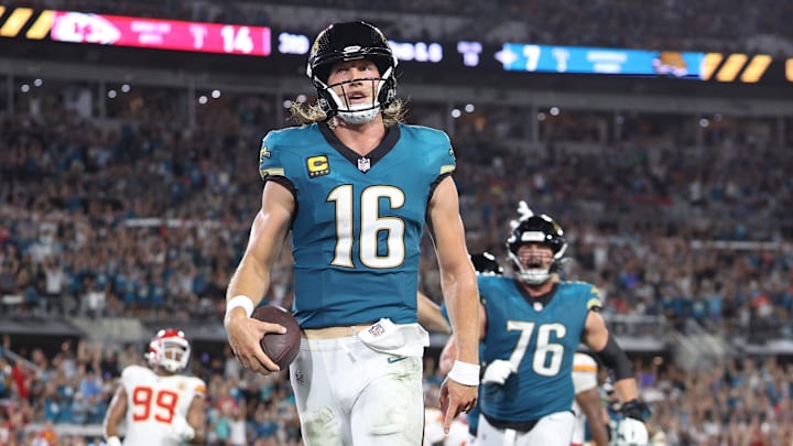 Oct 6, 2025; Jacksonville, Florida, USA; Jacksonville Jaguars quarterback Trevor Lawrence (16) scores a touchdown during the second half against the Kansas City Chiefs at EverBank Stadium. Mandatory Credit: Nathan Ray Seebeck-Imagn Images