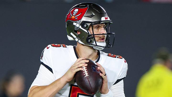 Aug 28, 2026; Jacksonville, Florida, USA; Tampa Bay Buccaneers quarterback Jake Browning (5) drops back to pass against the Jacksonville Jaguars in the fourth quarter during preseason at EverBank Stadium. 