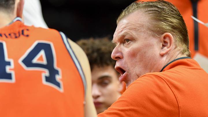 Illinois Fighting Illini head coach Brad Underwood leads a team huddle Saturday, March 21, 2026, during the NCAA Men’s Basketball Tournament second round game against the VCU Rams at Bon Secours Wellness Arena in Greenville, South Carolina.