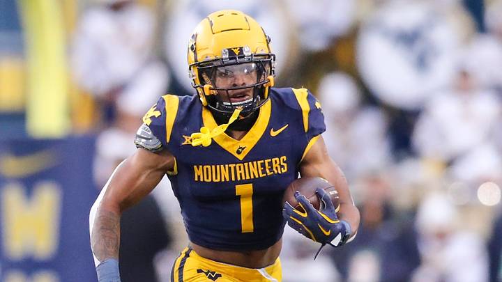 Nov 16, 2024; Morgantown, West Virginia, USA; West Virginia Mountaineers running back Jahiem White (1) runs the ball during the first quarter against the Baylor Bears at Mountaineer Field at Milan Puskar Stadium. Mandatory Credit: Ben Queen-Imagn Images Nov 16, 2024; Morgantown, West Virginia, USA; West Virginia Mountaineers running back Jahiem White (1) runs the ball during the first quarter against the Baylor Bears at Mountaineer Field at Milan Puskar Stadium. Mandatory Credit: Ben Queen-Imagn Images