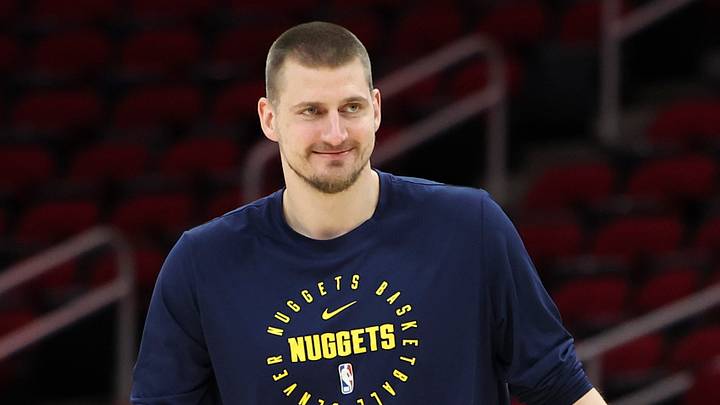 Mar 23, 2025; Houston, Texas, USA; Denver Nuggets center Nikola Jokic (15) smiles on the court before the game against the Houston Rockets at Toyota Center. Mandatory Credit: Troy Taormina-Imagn Images Mar 23, 2025; Houston, Texas, USA; Denver Nuggets center Nikola Jokic (15) smiles on the court before the game against the Houston Rockets at Toyota Center. Mandatory Credit: Troy Taormina-Imagn Images