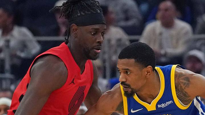 Portland Trail Blazers guard Jrue Holiday guards Golden State Warriors guard De'Anthony Melton. Portland Trail Blazers guard Jrue Holiday guards Golden State Warriors guard De'Anthony Melton.