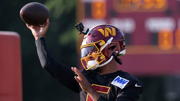 Ashburn, VA, USA: Washington Commanders quarterback Jayden Daniels (5) passes the ball during a drill at the BigBear.ai Performance Center at Commanders Park. Mandatory Credit: Geoff Burke-Imagn Images Ashburn, VA, USA: Washington Commanders quarterback Jayden Daniels (5) passes the ball during a drill at the BigBear.ai Performance Center at Commanders Park. Mandatory Credit: Geoff Burke-Imagn Images