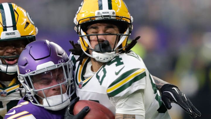 Minnesota Vikings linebacker Ivan Pace Jr. tackles Green Bay Packers receiver Jakobie Keeney-James (84) on a kickoff return.