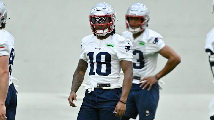 May 9, 2025; Foxborough, MA, USA; New England Patriots wide receiver Kyle Williams (18) warms up before practice at rookie camp at Gillette Stadium. Mandatory Credit: Eric Canha-Imagn Images