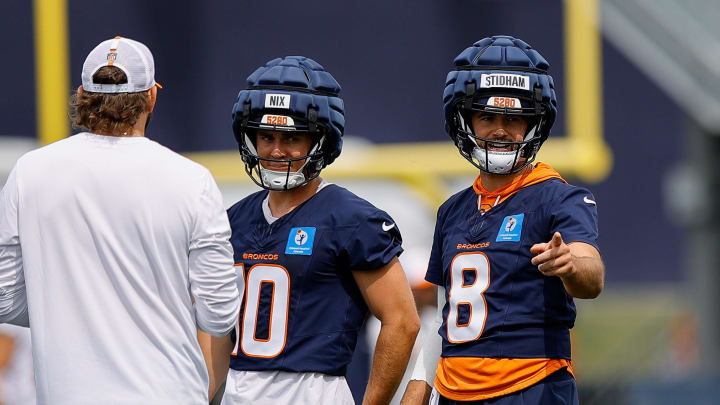 Jul 26, 2024; Englewood, CO, USA; Denver Broncos quarterback Jarrett Stidham (8) and quarterback Bo Nix (10) during training camp practices. 