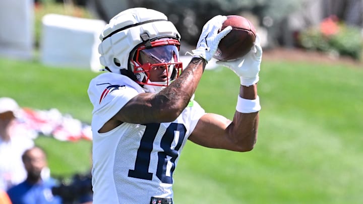 Jul 23, 2025; Foxborough, MA, USA; New England Patriots wide receiver Kyle Williams (18) makes a catch during training camp at Gillette Stadium. Mandatory Credit: Eric Canha-Imagn Images