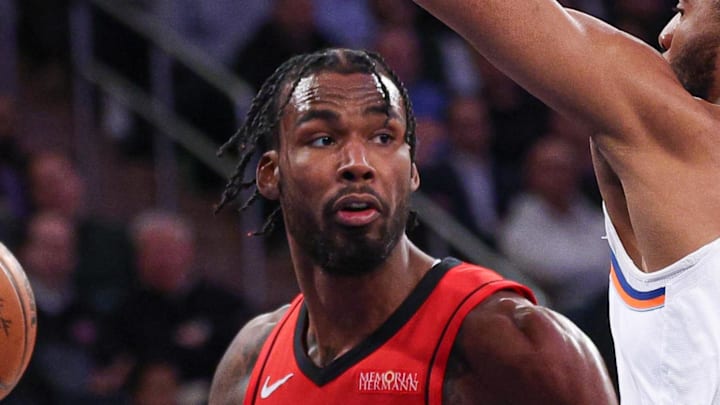Feb 3, 2025; New York, New York, USA; Houston Rockets forward Tari Eason (17) looks to pass asNew York Knicks forward Mikal Bridges (25) defends during the first half at Madison Square Garden. Mandatory Credit: Vincent Carchietta-Imagn Images