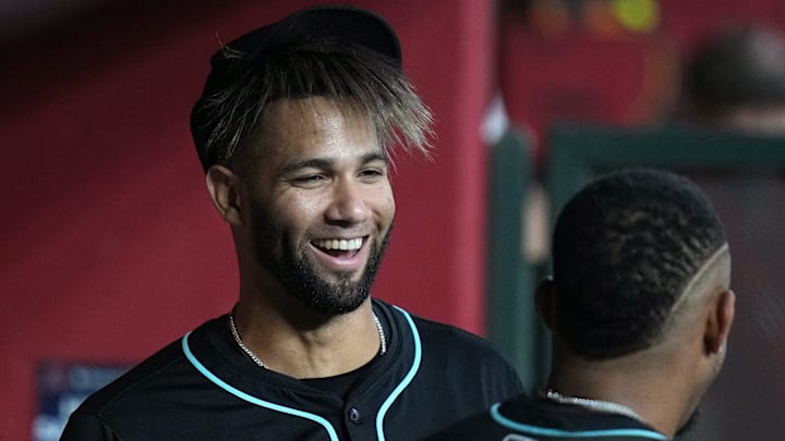 Arizona Diamondbacks outfielder Lourdes Gurriel Jr. (12) smiles in the dugout with his teammates before they play against the Cleveland Guardians at Chase Field on Aug. 19, 2025. Arizona Diamondbacks outfielder Lourdes Gurriel Jr. (12) smiles in the dugout with his teammates before they play against the Cleveland Guardians at Chase Field on Aug. 19, 2025.