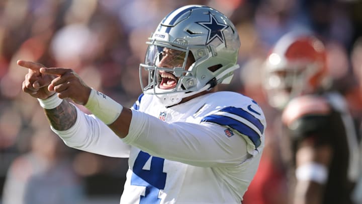Sep 8, 2024; Cleveland, Ohio, USA; Dallas Cowboys quarterback Dak Prescott (4) celebrates after a touchdown during the first half against the Cleveland Browns at Huntington Bank Field. Mandatory Credit: Ken Blaze-Imagn Images