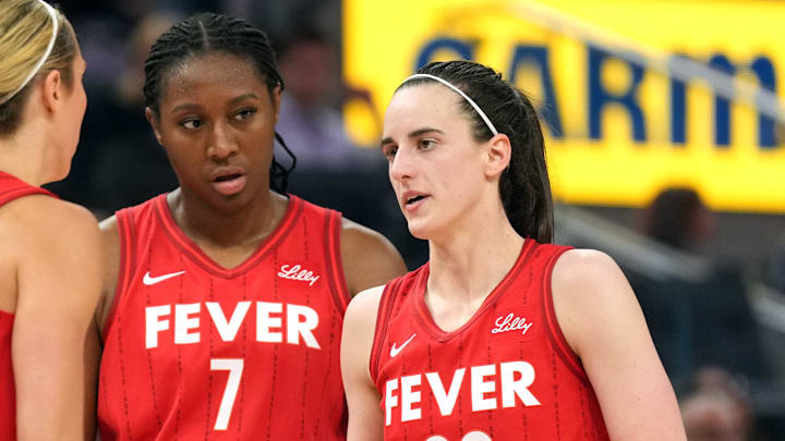 Jun 19, 2025; San Francisco, California, USA; Indiana Fever guard Caitlin Clark (22) talks to guard Lexie Hull (left) and forward Aliyah Boston (7) during the third quarter against the Golden State Valkyries at Chase Center. Mandatory Credit: Darren Yamashita-Imagn Images Jun 19, 2025; San Francisco, California, USA; Indiana Fever guard Caitlin Clark (22) talks to guard Lexie Hull (left) and forward Aliyah Boston (7) during the third quarter against the Golden State Valkyries at Chase Center. Mandatory Credit: Darren Yamashita-Imagn Images