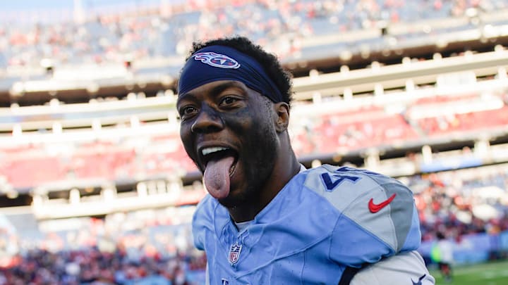 Tennessee Titans linebacker Arden Key celebrates the victory