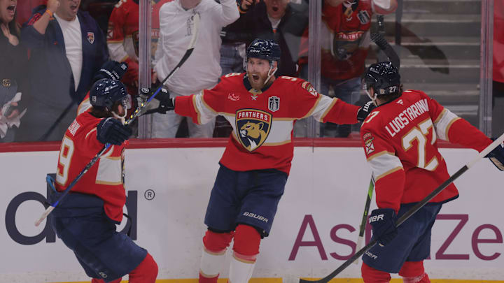 Jun 9, 2025; Sunrise, Florida, USA; Florida Panthers forward Sam Bennett (9) celebrates scoring against the Edmonton Oilers with forward Matthew Tkachuk (19) and forward Eetu Luostarinen (27) in game three of the 2025 Stanley Cup Final at Amerant Bank Arena. Mandatory Credit: Sam Navarro-Imagn Images