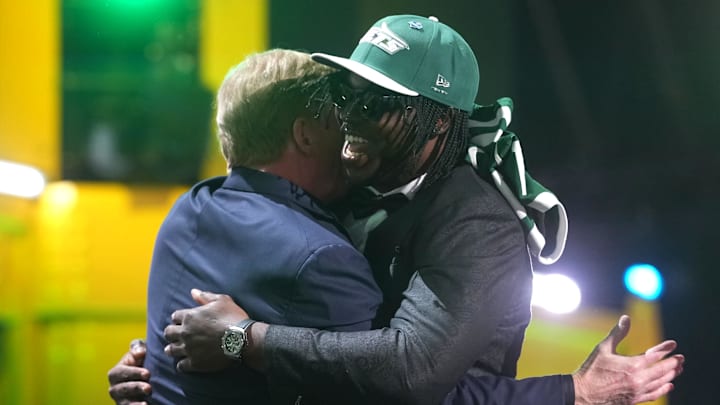 New York Jets edge rusher David Bailey hugs Roger Goodell