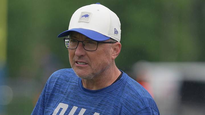 Bills offensive coordinator Pete Carmichael watches as then quarterbacks warm up before practice at Bills Training Camp at St. John Fisher University on July 30, 2026 in Pittsford.