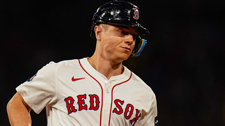 Sep 9, 2024; Boston, Massachusetts, USA; Boston Red Sox designated hitter Tyler O'Neill (17) hits a home run against the Baltimore Orioles in the third inning at Fenway Park. Mandatory Credit: David Butler II-Imagn Images