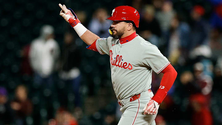 May 19, 2025; Denver, Colorado, USA; Philadelphia Phillies designated hitter Kyle Schwarber (12) gestures as he rounds the bases on a solo home run in the ninth inning against the Colorado Rockies at Coors Field May 19, 2025; Denver, Colorado, USA; Philadelphia Phillies designated hitter Kyle Schwarber (12) gestures as he rounds the bases on a solo home run in the ninth inning against the Colorado Rockies at Coors Field