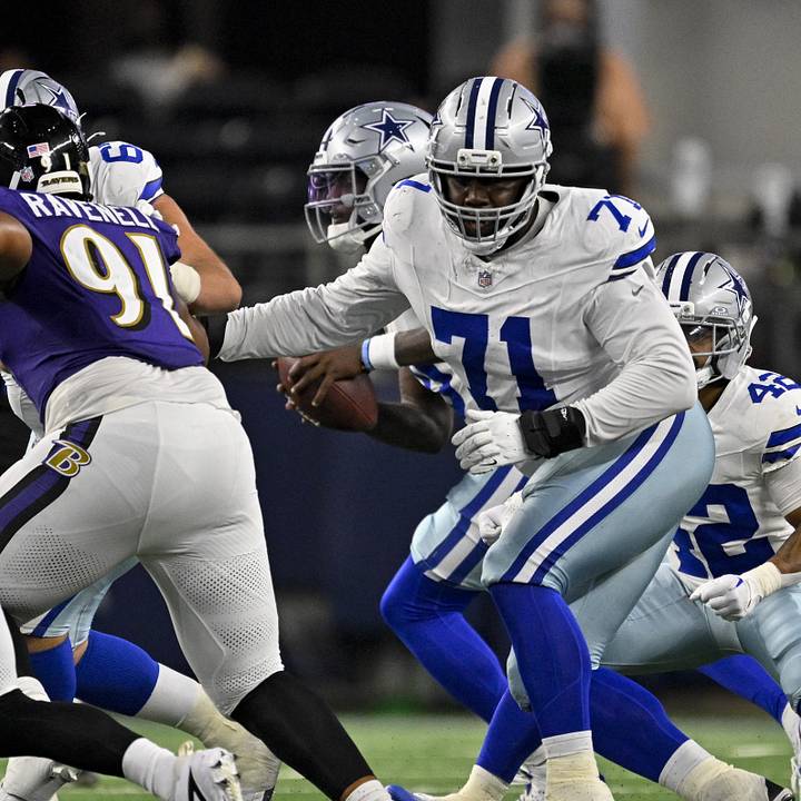 Dallas Cowboys offensive tackle Nate Thomas in action during the game against the Baltimore Ravens at AT&T Stadium.