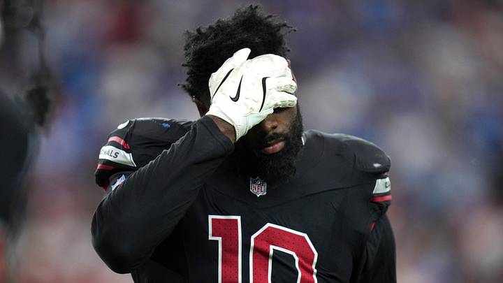 Arizona Cardinals linebacker Josh Sweat (10) walks off the field after the defense gives up a touchdown to the Detroit Lions at State Farm Stadium in Glendale on Oct. 11, 2026. Arizona Cardinals linebacker Josh Sweat (10) walks off the field after the defense gives up a touchdown to the Detroit Lions at State Farm Stadium in Glendale on Oct. 11, 2026.