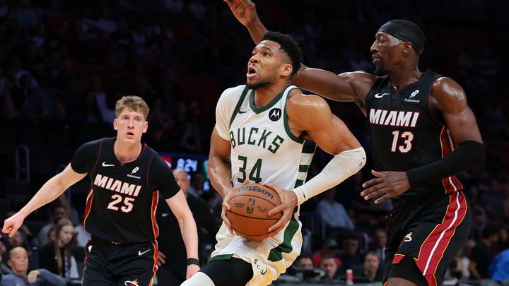 Mar 12, 2026; Miami, Florida, USA; Milwaukee Bucks forward Giannis Antetokounmpo (34) drives to the basket against Miami Heat center Bam Adebayo (13) during the first quarter at Kaseya Center. Mandatory Credit: Sam Navarro-Imagn Images Mar 12, 2026; Miami, Florida, USA; Milwaukee Bucks forward Giannis Antetokounmpo (34) drives to the basket against Miami Heat center Bam Adebayo (13) during the first quarter at Kaseya Center. Mandatory Credit: Sam Navarro-Imagn Images