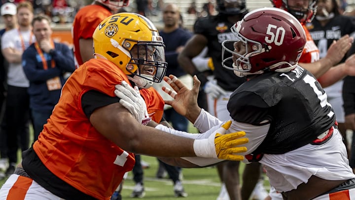 American team offensive lineman Miles Frazier of LSU (70). American team offensive lineman Miles Frazier of LSU (70).